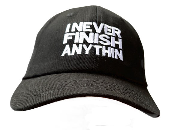 I Never Finish Anythin - Polo Style Ball Cap - Various Colors with White Stitching