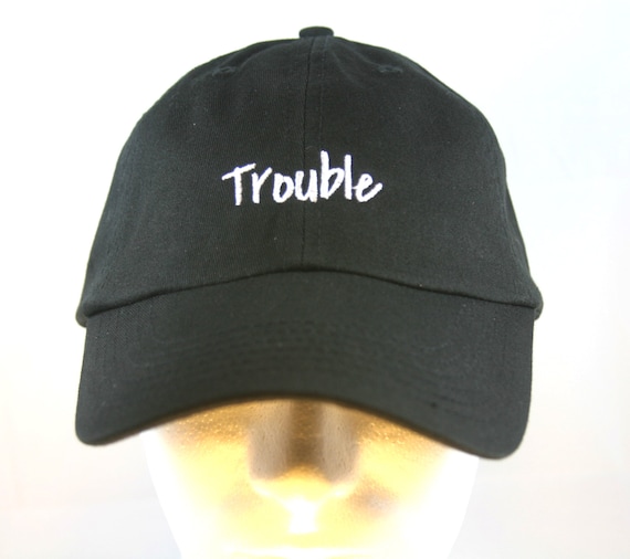 Trouble - Polo Style Ball Cap (Black with White Stitching)