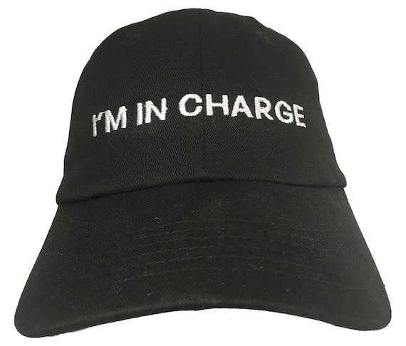 I'm In Charge (Youth Size Dad Cap Polo Style Ball Cap - Black with White Stitching)