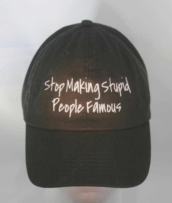 Stop Making Stupid People Famous (Polo Style Ball Black with White Stitching)