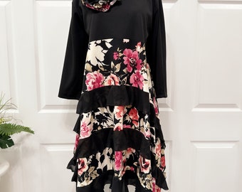 Black ruffles and pink floral tunic top