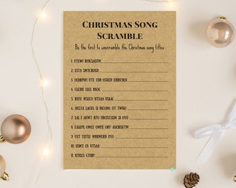 May include: A kraft paper Christmas Song Scramble game with the title at the top. The game includes 11 scrambled song titles to unscramble. The game is surrounded by Christmas ornaments and a white ribbon.