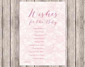 Könnte beinhalten: Eine rosa und weiße Karte mit einem Spitzenmuster und dem Text "Wishes for the Baby" in rosa Kursivschrift. Die Karte enthält eine Liste von Wünschen für ein Baby, wie z. B. "Ich hoffe, du lernst...", "Ich hoffe, du bekommst...", "Ich hoffe, du liebst...", und "Ich hoffe, du kannst..."