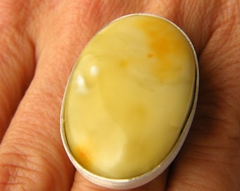 Signet ring made of Baltic amber stone and sterling silver