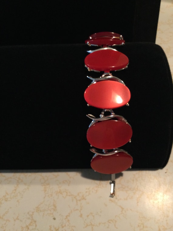 Red lucite 1950's link bracelet. (Could be lucite 