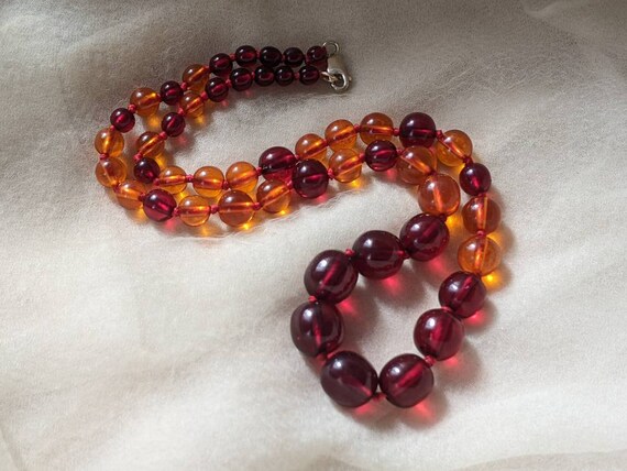 vintage Bakelite plastic translucent cherry juice… - image 1