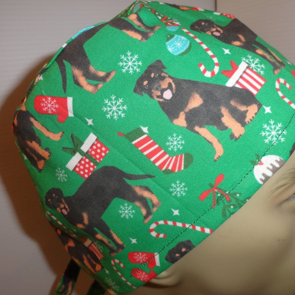 Ready to ship Men's scrub hat, surgical hat, surgeon's hat, Rottweilers at Christmas, stockings, presents ,on green cotton, ties in back