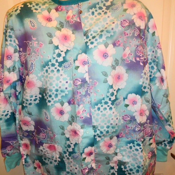 Jacket ready to ship, Chest 42", hips 46", long sleeves, rounded neck, snaps down front /flowers pink Dr. RN.Vet tech. CNA, last one