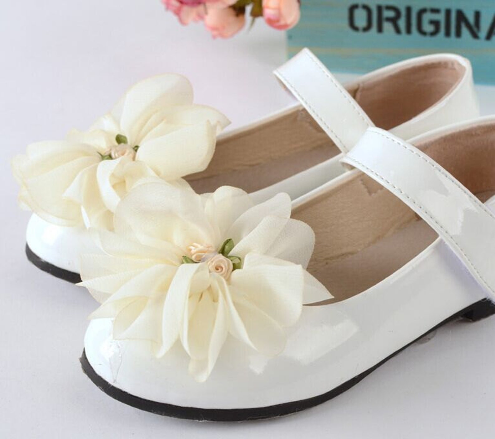 white flat flower girl shoes