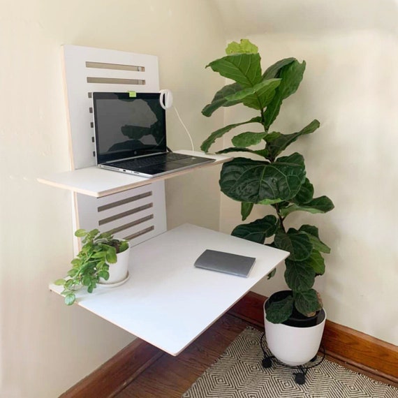Wall mounted stand up clearance desk