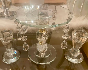 Portavelas Crystal Unity con detalles en oro brillante y diamantes de imitación. 2 portavelas cónicos y 1 portavelas de pilar. Ceremonia de la boda