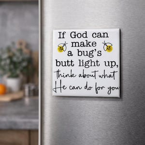 May include: A white square magnet with the text "If God can make a bug's butt light up, think about what He can do for you." The magnet has two yellow and black firefly illustrations.