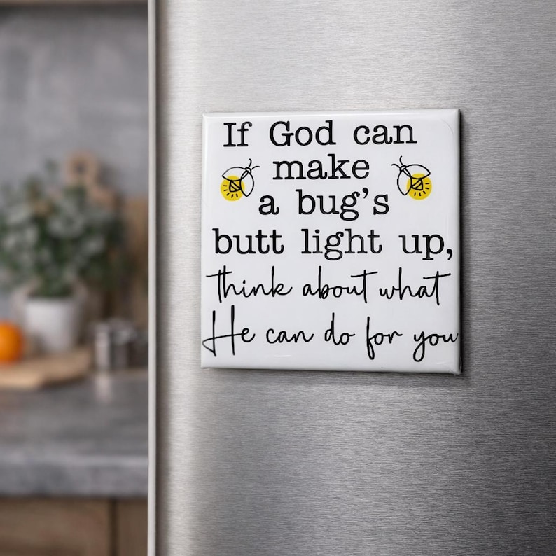 May include: A white square magnet with the text "If God can make a bug's butt light up, think about what He can do for you." The magnet has two yellow and black firefly illustrations.