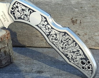 Spyderco Byrd stainless steel folding knife, hand engraved