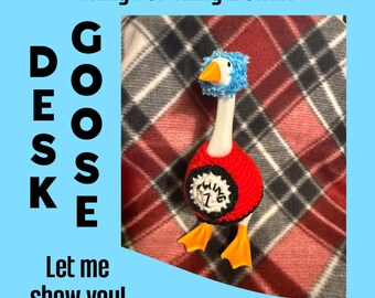 May include: A white plastic goose figurine wearing a red crocheted sweater with a circular white patch labeled Thing 1 and a blue fuzzy head covering. The text Thing 1 or Thing 2 outfit, DESK GOOSE, and Let me show you! appear in the image.