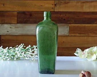 Antique green glass bottle