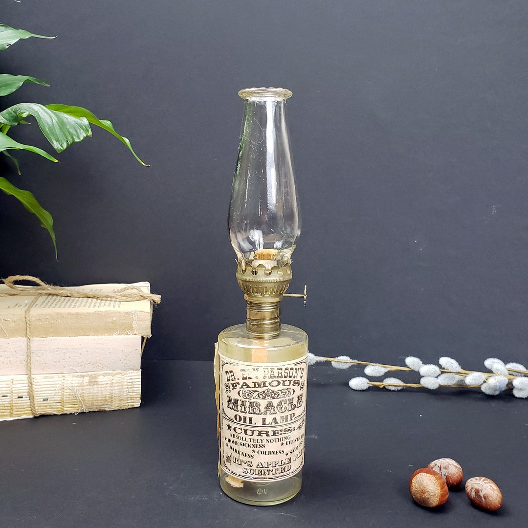 Dr. Ely Parson's Famous Miracle Oil Lamp Cures Absolutely Nothing Apple
