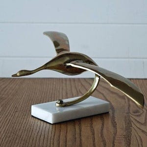 Vintage brass bird sculpture
