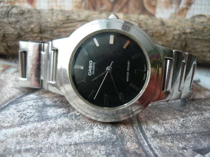 casio quartz water resist cena