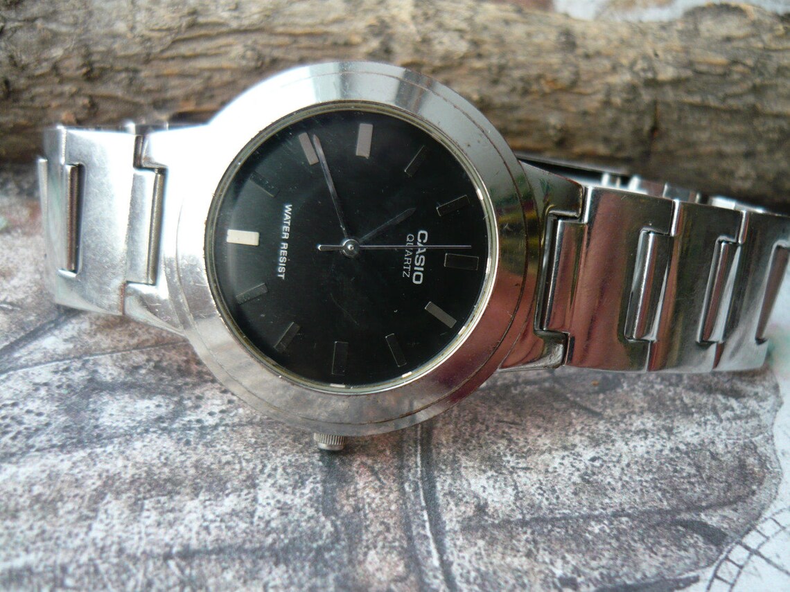casio quartz water resist cena