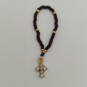Rosary, scale 1:12. Miniature for dollhouse.