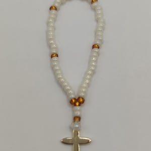 Rosary, scale 1:12. Miniature for dollhouse.