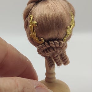 1/12 scale blonde wig for dollhouse miniatures.