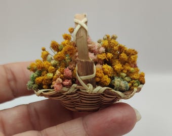 Basket with flowers, scale 1/12. Dollhouse miniature.