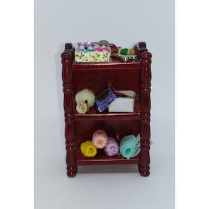 Wooden furniture scale 1:12, adorned with sewing motifs.