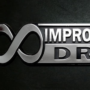 The Hitchhiker's Guide to the Galaxy Infinite Improbability Drive Car Emblem image 1