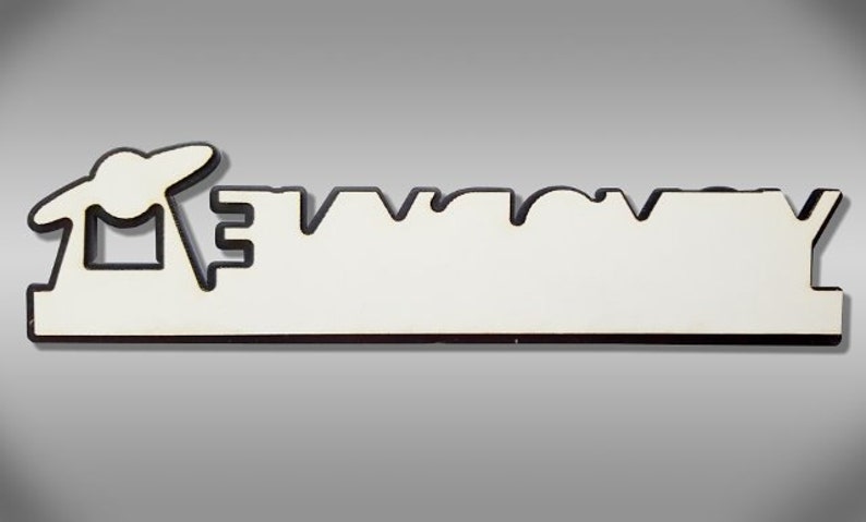 May include: White wooden sign with the word "remarkable" in black outlined letters. The first letter "R" is replaced with a stylized image of a UFO.