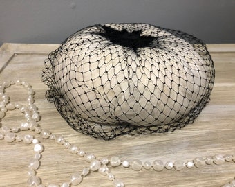 Vintage Women's Feathered Hat with Black Netting