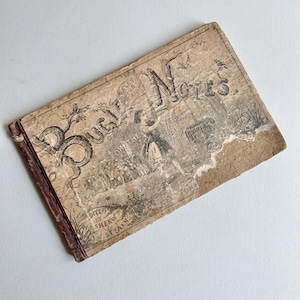 May include: Antique booklet titled "Bugle Notes" with a faded, sepia-toned cover. The cover features an illustration of a woman and text, with the title prominently displayed. The edges show wear and tear, giving it a vintage appearance.