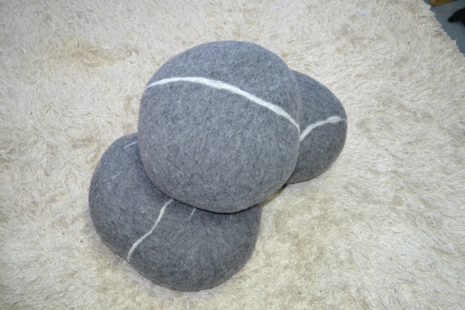 Felted pillow set of three felted rocks stone soft wool Etsy