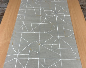 Light brown table runner with geometric white and gold stripes, Scandinavian design, geometrical table runner