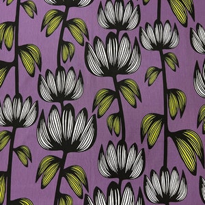 Purple tablecloth with black striped flowers and striped leaves, stylized flowers, modern style, Scandinavian design