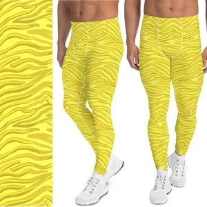 May include: Yellow and white striped leggings with a zebra print pattern.