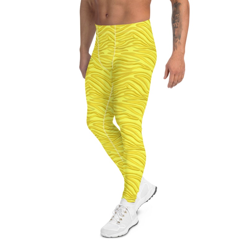 May include: Yellow athletic leggings with a zebra stripe pattern.