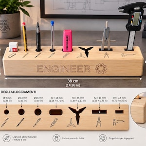 May include: A light-coloured wooden desk organiser for engineers, measuring 38 cm long, 6.8 cm high, and 6.5 cm deep. It features laser-engraved text reading ENGINEER with a gear icon and specific slots for stationery and technical tools.