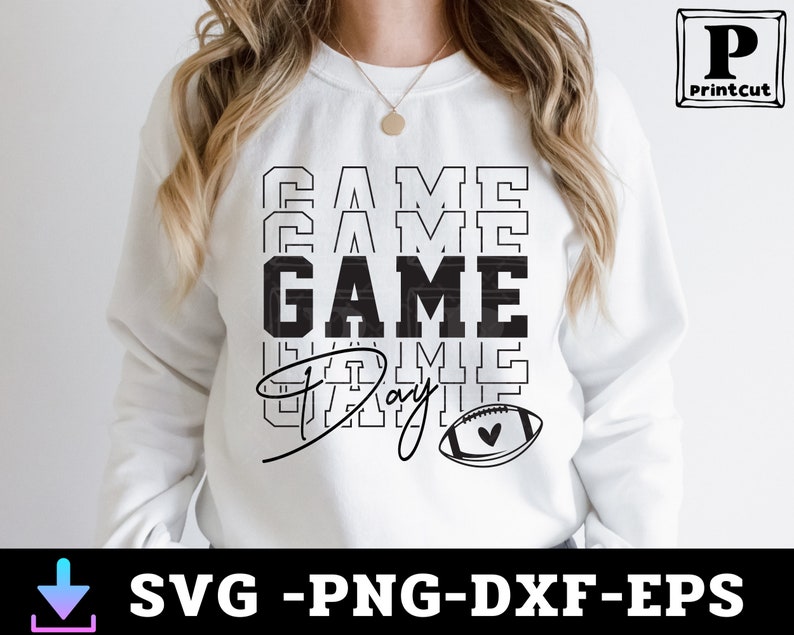 May include: White sweatshirt with black text that reads "GAME DAY" with a stylized football graphic.