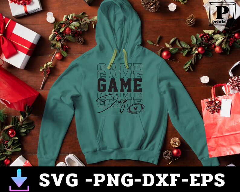 May include: Teal green hoodie with a black graphic that says "Game Day" with a football and heart design.