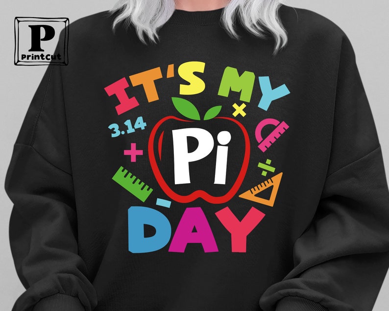 May include: Black sweatshirt with a colorful graphic design that says "It's My Pi Day" with a red apple with a white "Pi" inside.