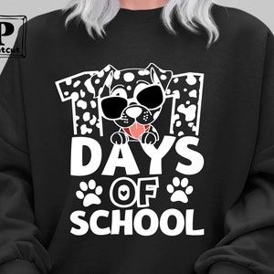 K&ouml;nnte beinhalten: Schwarzer Pullover mit einem wei&szlig;en Grafikdruck eines Dalmatiners mit dem Text "101 Tage Schule".