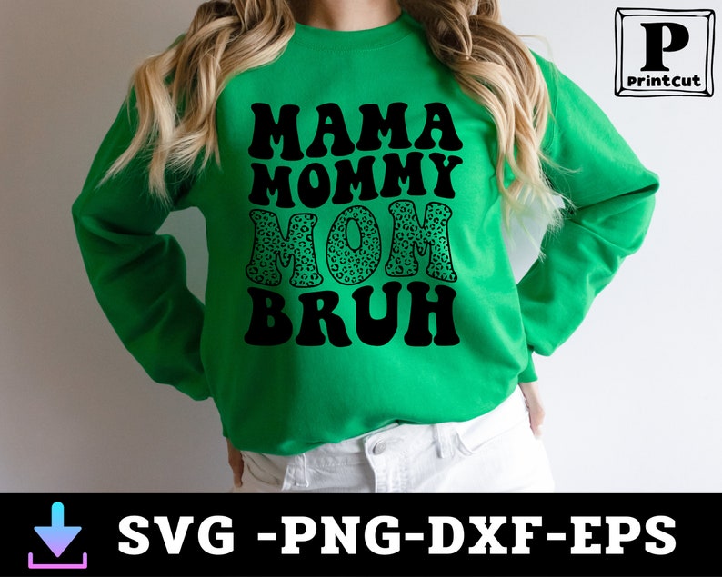 May include: Green sweatshirt with the text "Mama Mommy Mom  Bruh" in black with a leopard print design on the word "Mom".