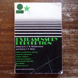 May include: A black and green book cover with the title "Extrasensory Perception" and the text "edited by G. E. W. Wolstenholme and Elaine C. P. Millar". The cover also features a green circle with a star inside.