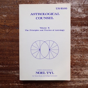 May include: A white book titled "ASTROLOGICAL COUNSEL" with blue text. The cover features the text "Volume X The Principles and Practice of Astrology" and a geometric design. The book is part of a twelve-volume series by Noel Tyl.