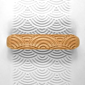 Rouleau de texture d’argile, rouleau de main de poterie - soleil levant