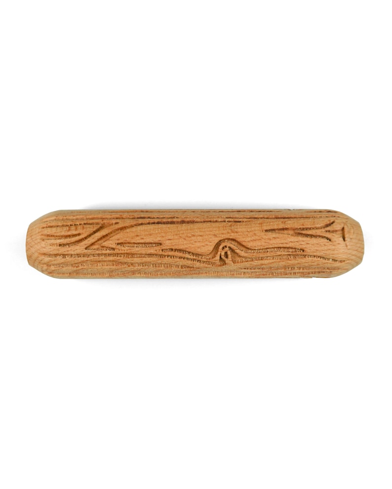 May include: A wooden rolling pin with a carved design. The rolling pin is light brown in color and has a smooth, rounded surface.