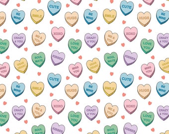 May include: A repeating pattern of pastel-colored heart-shaped candies with various phrases like "Kisses," "Be Mine," and "Love You" on a white background. Small red hearts are scattered throughout the design.