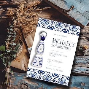 May include: A birthday invitation with a blue and white floral pattern. The invitation includes the text "MICHAEL'S 50th BIRTHDAY" and RSVP details. A decorative tequila bottle is also featured.